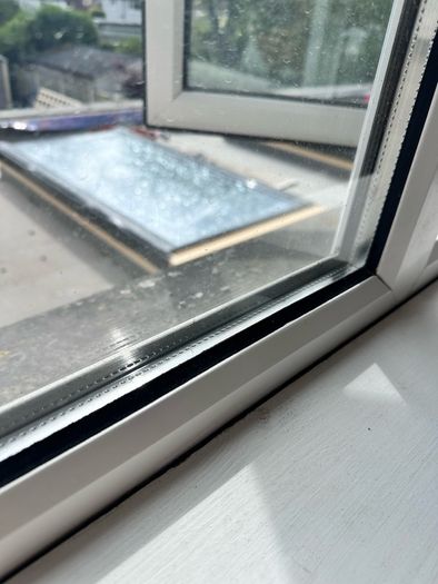 Double glazed white frame window