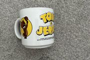 Vintage Tom &amp; Jerry ceramic mug featuring classic artwork of Tom and Jerry