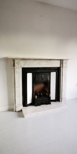 Regency Carrera Marble Bullseye Fireplace