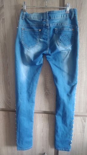 New koucla jeans with studs size small