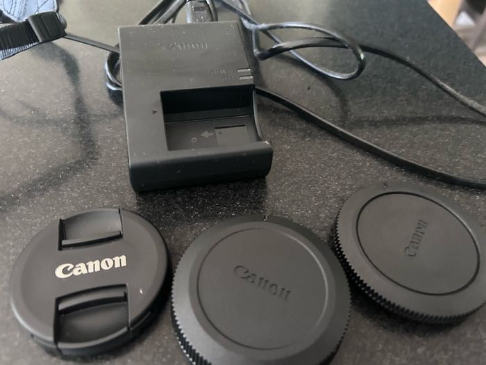canon Camera EOS RP with 24-50 mm F4.5-6.3 IS STM. This camera has literally never been used!. My daughter bought it in Conns Cameras in Dublin City and NEVER used it. Camera and lens comes with original boxes ( as new) and the shopping bag. Camera also c