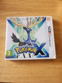 Pokemon X Game cartridge and boz