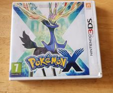Pokemon X Game cartridge and boz