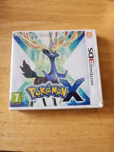 Pokemon X Game cartridge and boz