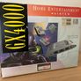 Boxed Amstrad GX4000 console with 2 controllers, cables, inserts, and pack-in game Image 2