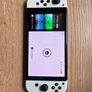 Nintendo Switch OLED White + Dock, Joy-Cons, Carry Case Image 3