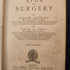 Aids To Surgery. By Joseph Cunning And Cecil A. Joll. 5th Edition 1924 Hardback In Fair Condition. See Photos For Same.