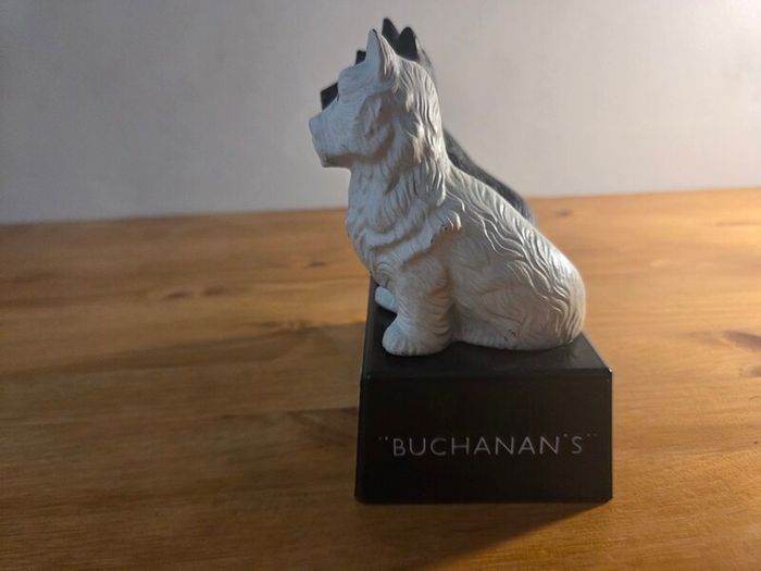 Black and white whiskey statue