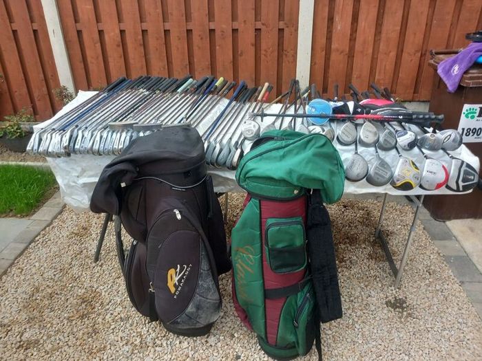A selection of golf clubs and bags. NOT SELLING SEPARATE