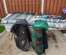 A selection of golf clubs and bags. NOT SELLING SEPARATE
