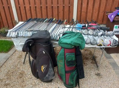 A selection of golf clubs and bags. NOT SELLING SEPARATE