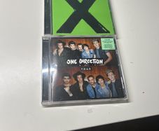 Two cds in great condition, four, X
