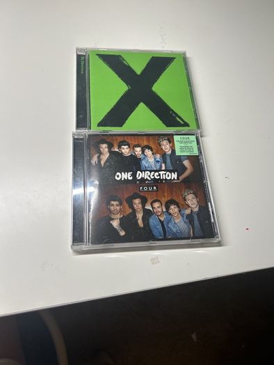 Two cds in great condition, four, X