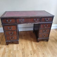 Pedestal desk with leather top