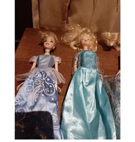 disney dolls and outfits bundle