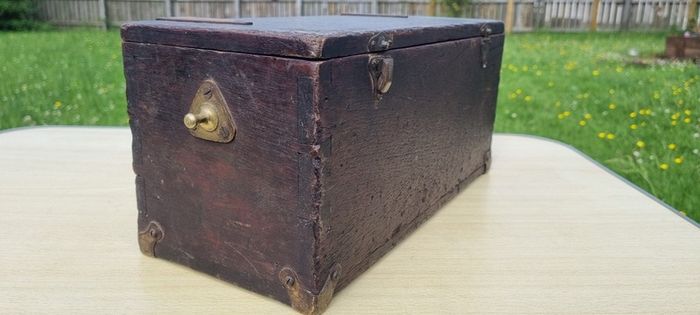 Old wooden box with brass fittings
