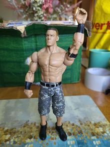 Bundle of WWE wrestling action figures loose