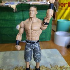 Bundle of WWE wrestling action figures loose