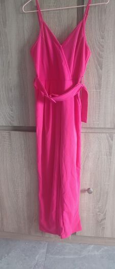 pink playsuit fits size small and medium