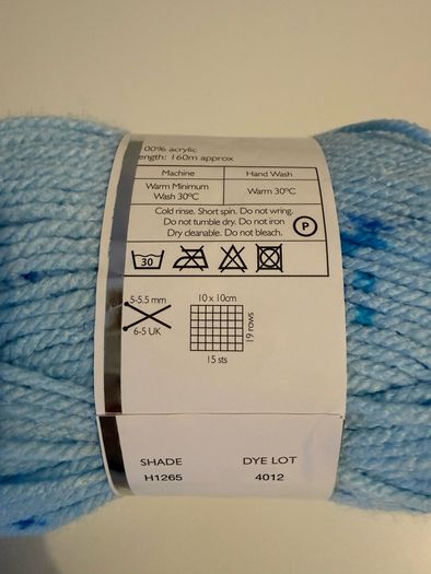 6 balls of blue yarn wool