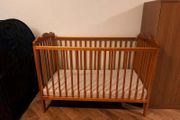Large Brown Wooden Baby Cot With Mattress