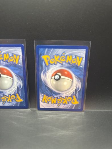 Yamper 099/094 | Zacian 100/094 Pokemon Cards