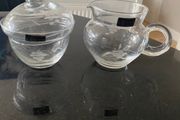 Duiske Irish glass lidded sugar bowl and jug