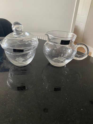 Duiske Irish glass lidded sugar bowl and jug