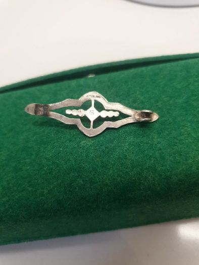 small silver brooch