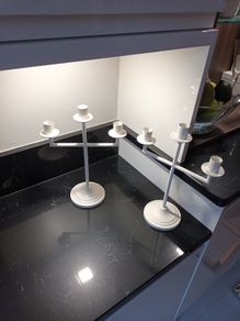 2 matching candle holders