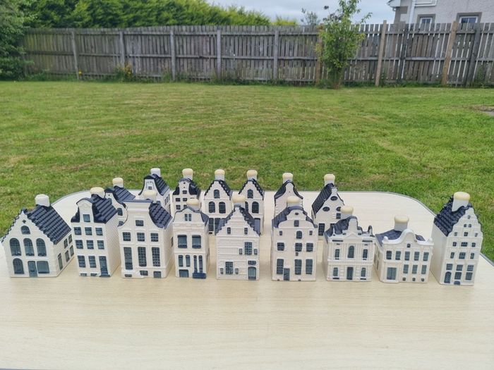Collection of 16 porcelain miniature houses KLM