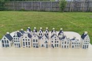 Collection of 16 porcelain miniature houses KLM