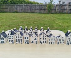 Collection of 16 porcelain miniature houses KLM