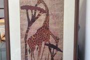 framed giraffe painting