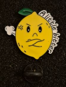 A little bitter ! , Pin back badge.