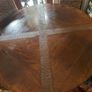 Walnut veneer dining table and four rattan dining chairs Image 2