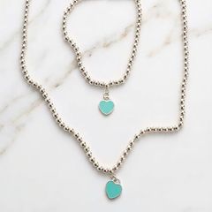 Double-sided heart necklace and bracelet