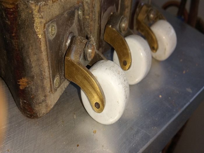 3 vintage porcelain casters