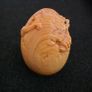 Carved wooden dragon hatching from an egg. Image 4