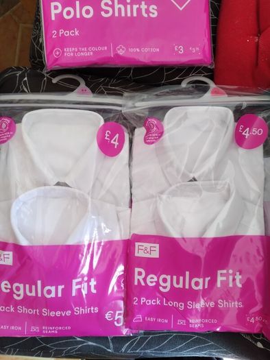 Girls uniform shirts and polo shirts. All brand new in wrappers.