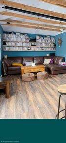 Brown L shaped leather sofa