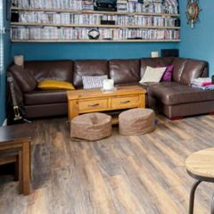 Brown L shaped leather sofa