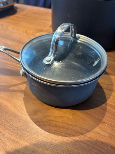 Set of All Clad pots and pans