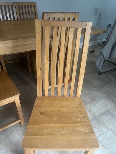 Solid Oak extending dining table and chairs