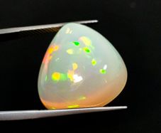 Massive 20.14ct Natural Crystal Opal (Play on colours). Certified Gem Report Antwerp
