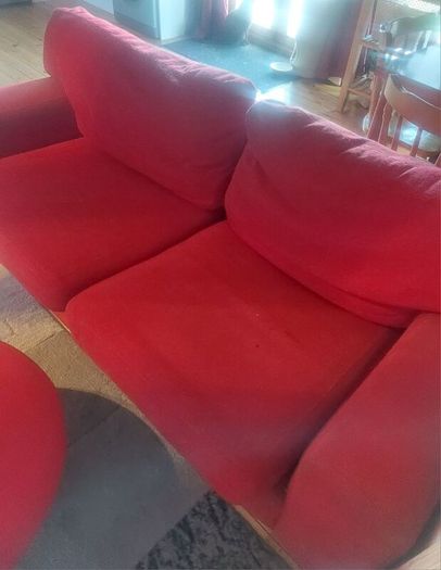 Red sofa and footstool