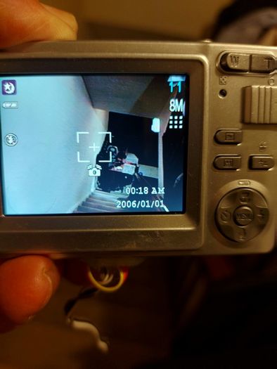 Z880 Digital Camera, Takes 2AA Batteries, working fine, has a modification that doesn't affect its performance