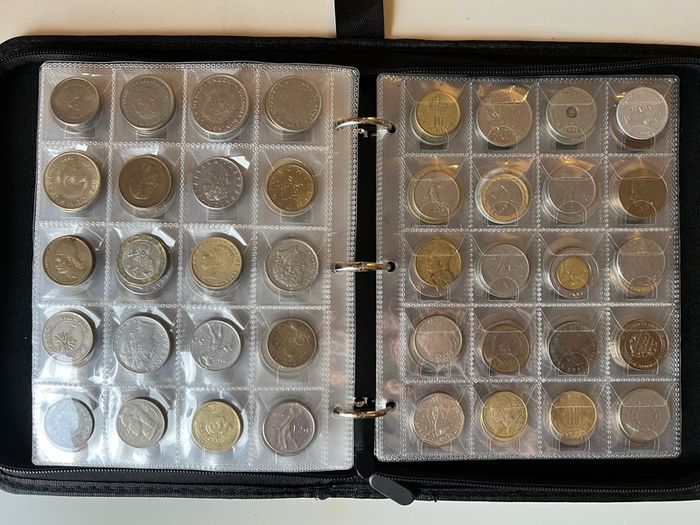 Coins collection foreign unknown 300 coins in album