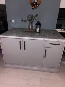 kitchen island and two stools