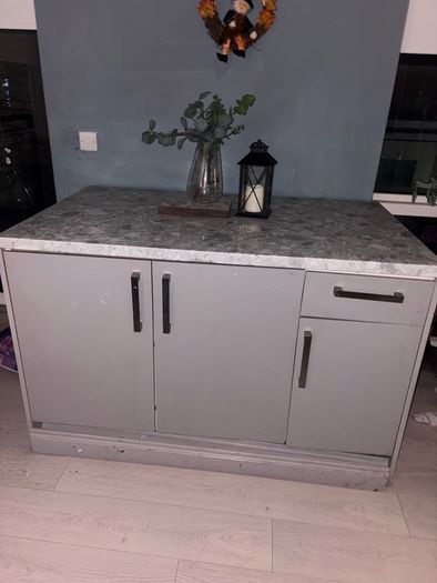 kitchen island and two stools